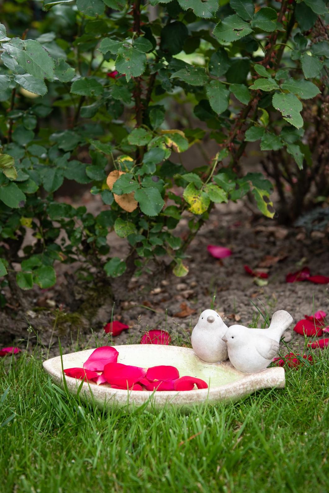 Ceramic birdbath with a pair of birds Garden ID