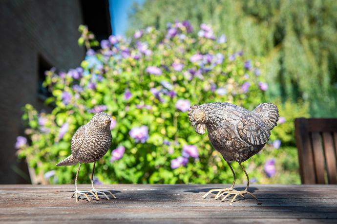 Hen and bird stone effect ornaments